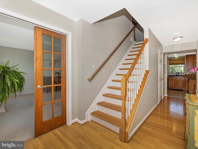 330 Mountaineers Way, Emmitsburg, MD 21727 - staircase with wood-type flooring, baseboards, and french doors