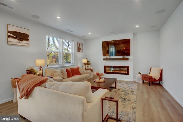 living room featuring light hardwood / wood-style flooring