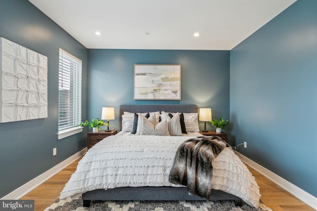 bedroom featuring light wood-type flooring