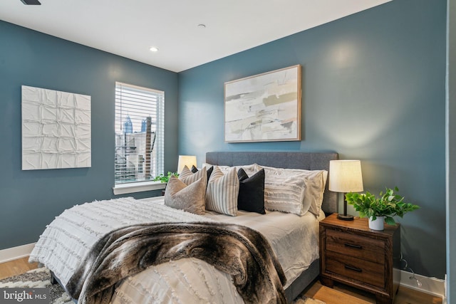 bedroom featuring hardwood / wood-style flooring