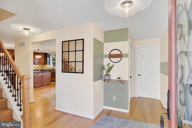 foyer featuring light hardwood / wood-style floors