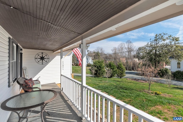 balcony featuring covered porch