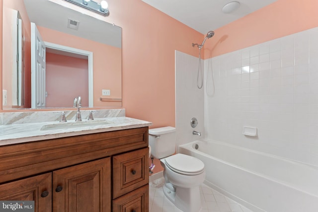 bathroom with toilet, vanity, visible vents, shower / bathing tub combination, and tile patterned floors