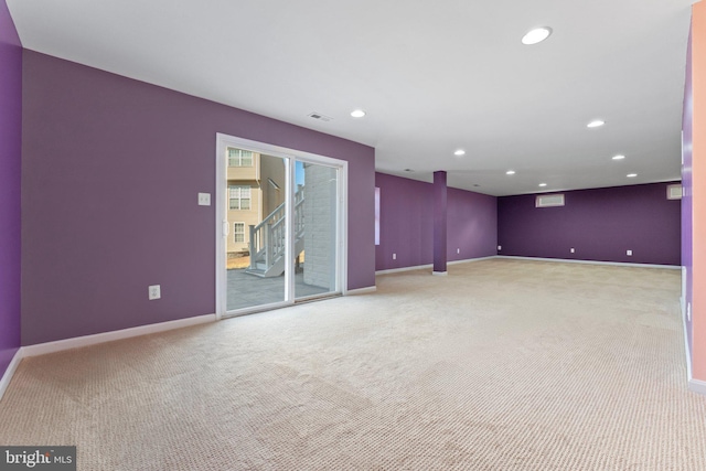 unfurnished room featuring light carpet, baseboards, visible vents, and recessed lighting