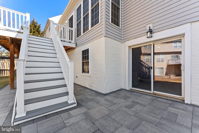 view of patio featuring stairway