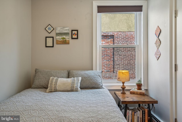 bedroom featuring a baseboard radiator