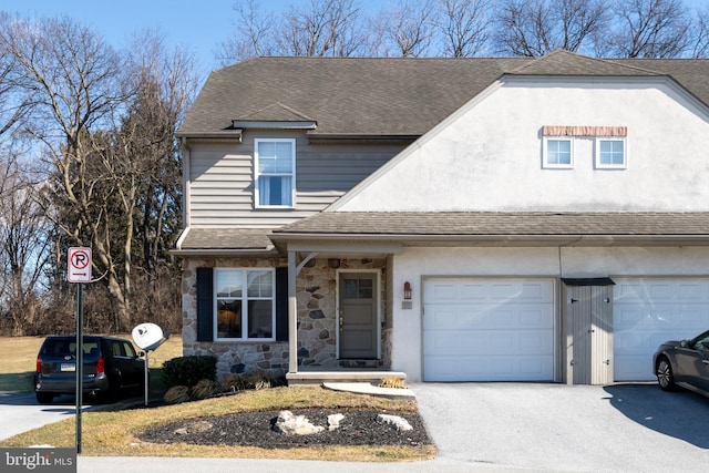 view of property featuring a garage