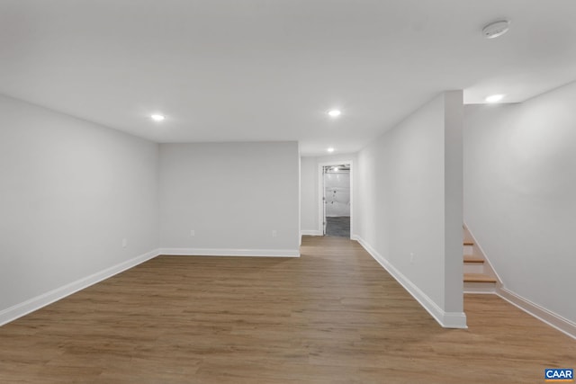 basement with light wood-type flooring