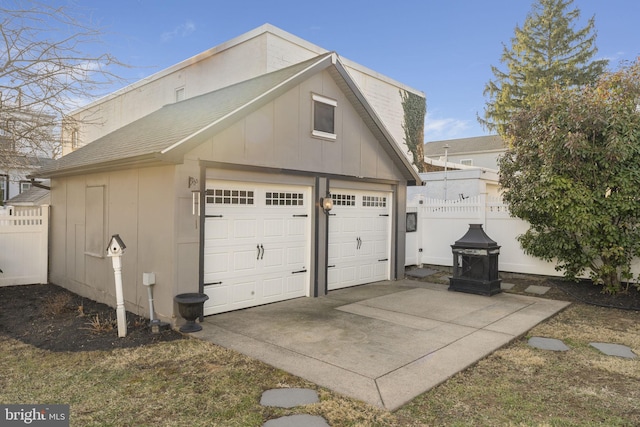 garage featuring fence