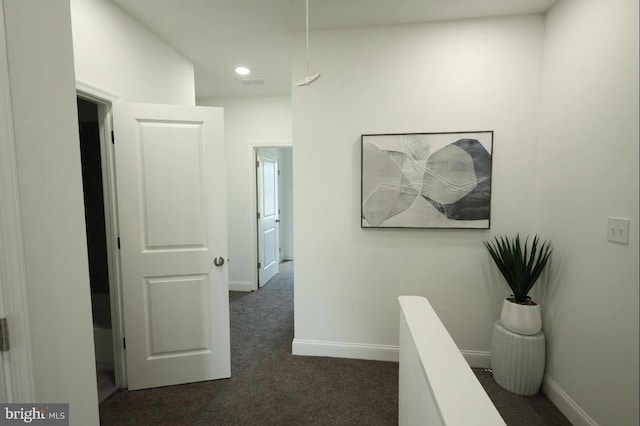 3324 N Market St, Wilmington, DE 19802 - hallway featuring dark carpet, baseboards, and recessed lighting