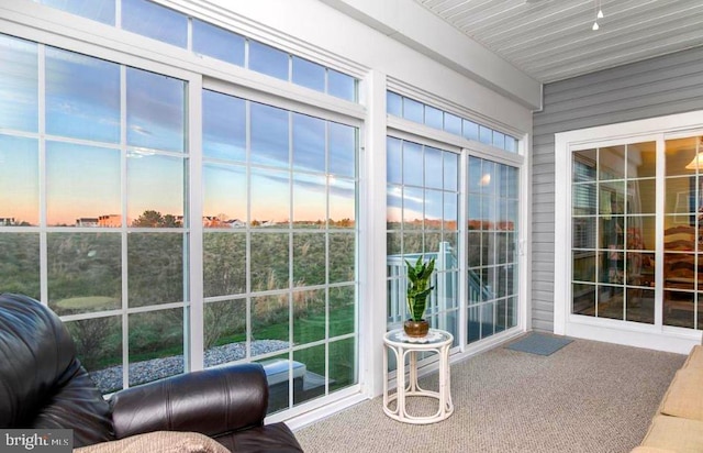 sunroom featuring a healthy amount of sunlight