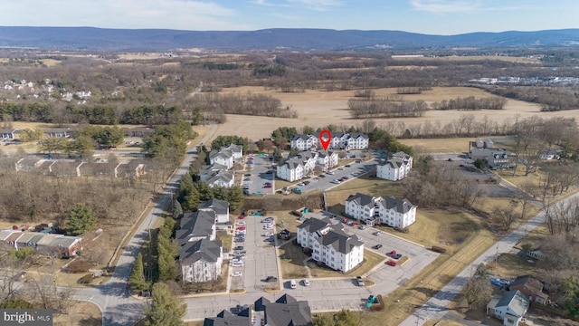 birds eye view of property featuring a residential view and a mountain view