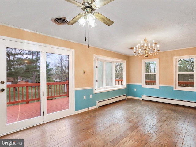 374 Tuscawilla Dr, Charles Town, WV 25414 - interior space featuring visible vents, a baseboard radiator, and an inviting chandelier
