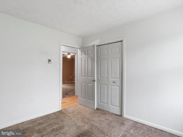 374 Tuscawilla Dr, Charles Town, WV 25414 - unfurnished bedroom featuring carpet floors, baseboards, and a closet