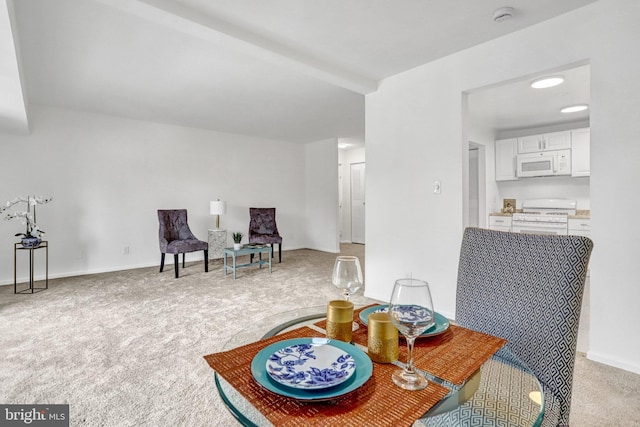 7807 Dassett Ct Unit 304, Annandale, VA 22003 - dining space featuring light colored carpet and baseboards