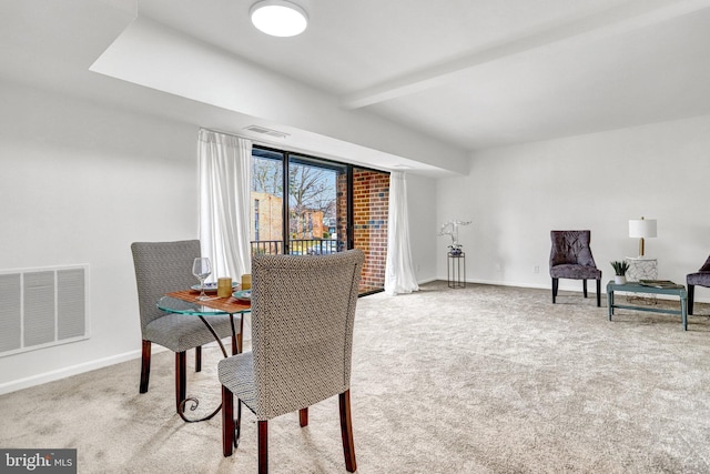 interior space with carpet, visible vents, and baseboards