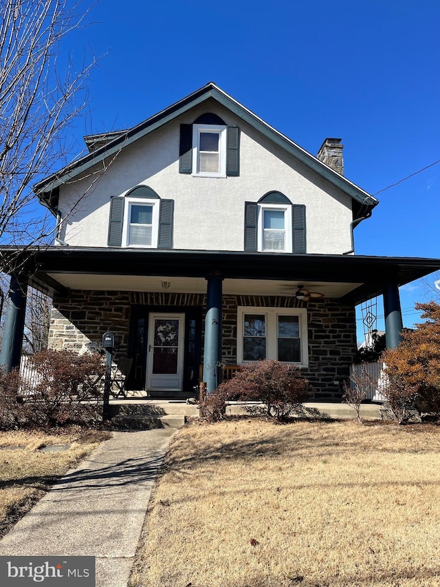 front facade featuring covered porch