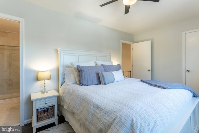 bedroom with a ceiling fan and connected bathroom