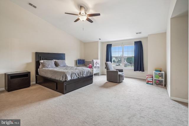 carpeted bedroom with a ceiling fan, visible vents, vaulted ceiling, and baseboards