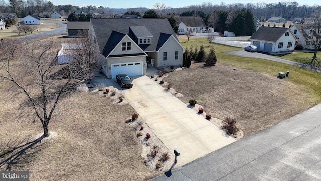 birds eye view of property with a residential view