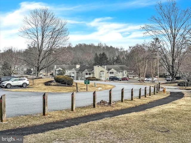 view of yard with a residential view