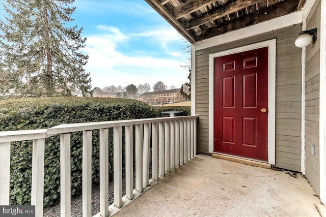 property entrance with a balcony