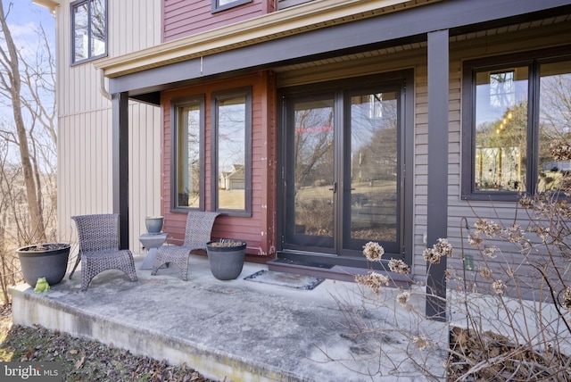 entrance to property with a patio area