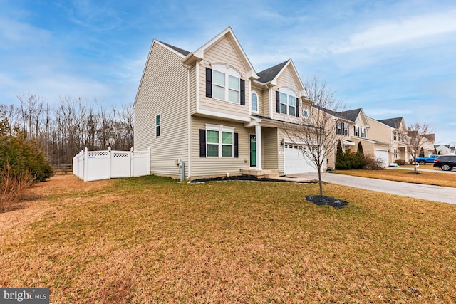 view of front of property with a front lawn, fence, a residential view, concrete driveway, and a garage