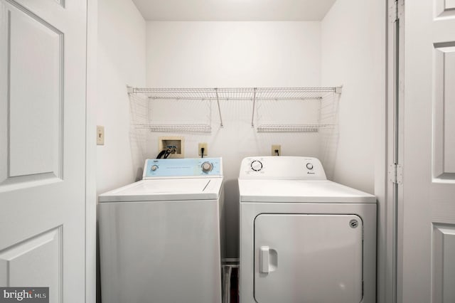 laundry area with washer and dryer