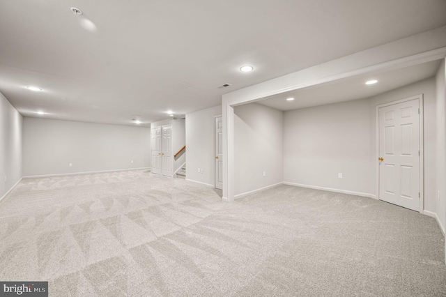 basement with light carpet