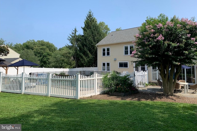 exterior space featuring a patio area and fence