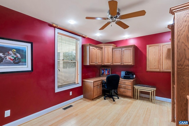 office space with ceiling fan and light hardwood / wood-style floors