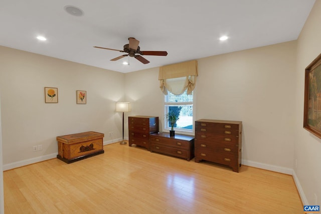 interior space with ceiling fan and light wood-type flooring