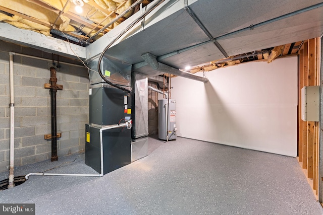 unfinished basement featuring gas water heater, concrete block wall, and heating unit