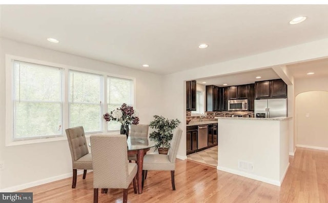 dining space featuring light hardwood / wood-style flooring