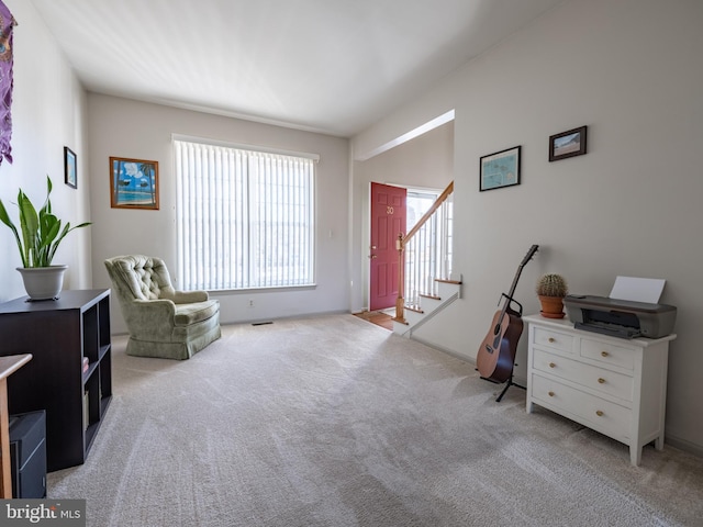 sitting room with light carpet