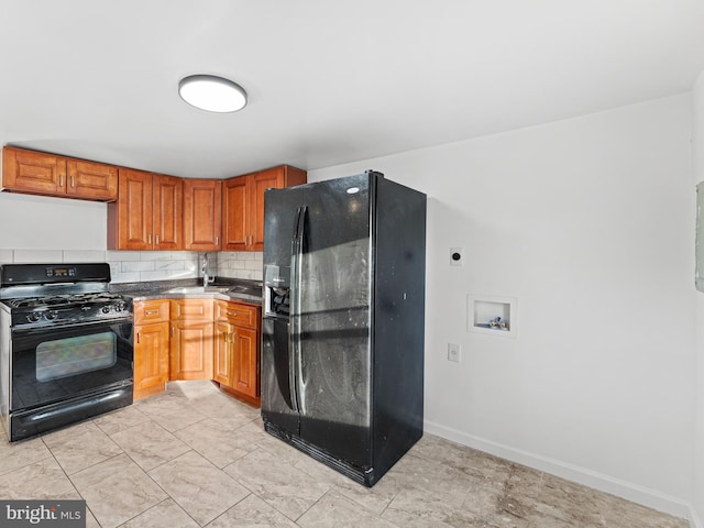 kitchen featuring backsplash and black appliances