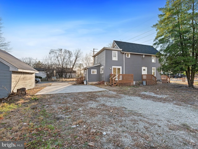 view of property exterior featuring a patio