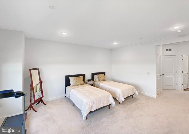 bedroom featuring light carpet, recessed lighting, and baseboards