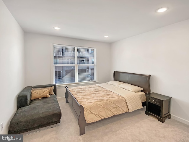 bedroom with light carpet, baseboards, and recessed lighting