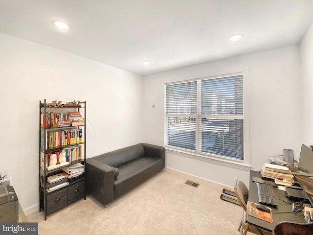 interior space with light carpet, baseboards, visible vents, and recessed lighting