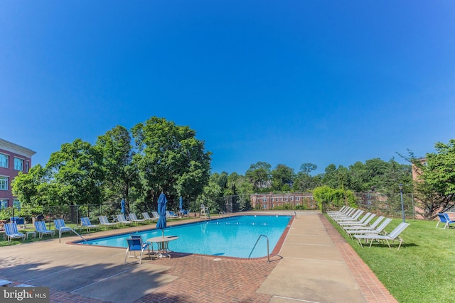 view of pool featuring a patio