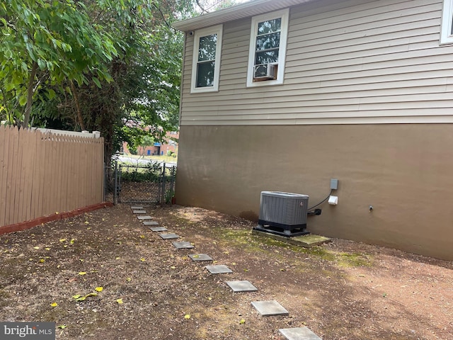 view of side of home featuring central air condition unit