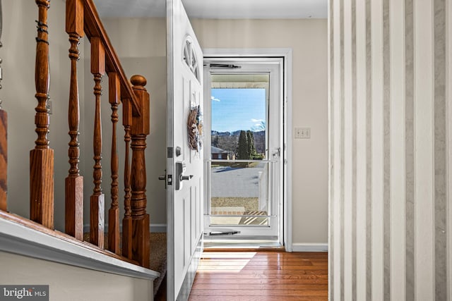 doorway featuring hardwood / wood-style flooring