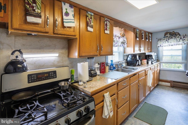 kitchen with gas range and sink