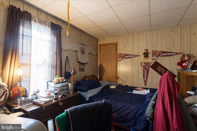 bedroom with a paneled ceiling