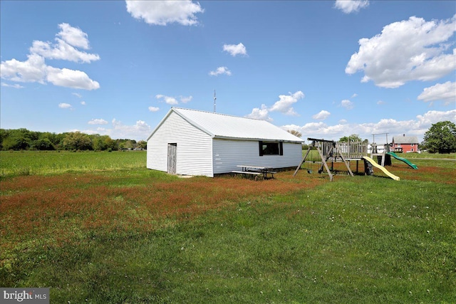 view of yard with a playground