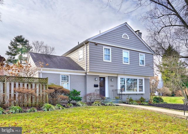 view of front of home with a front yard