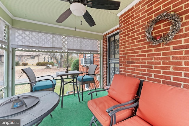 sunroom featuring cooling unit, a healthy amount of sunlight, and ceiling fan