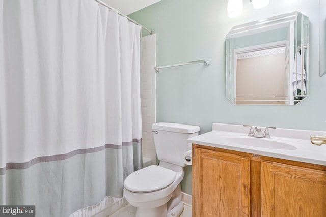 full bathroom featuring vanity and toilet